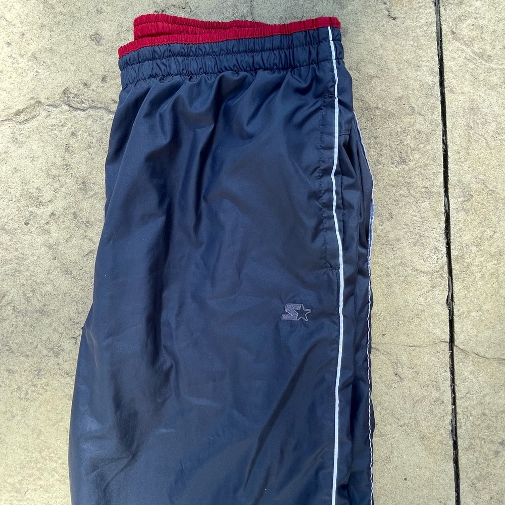 very baggy vintage starter track pants